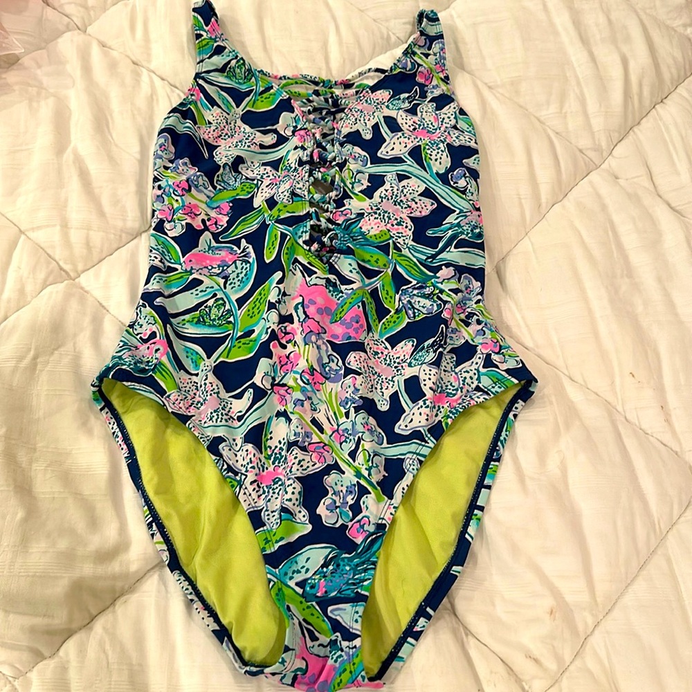 Lilly Pulitzer one piece with cross cross detailing in front and back